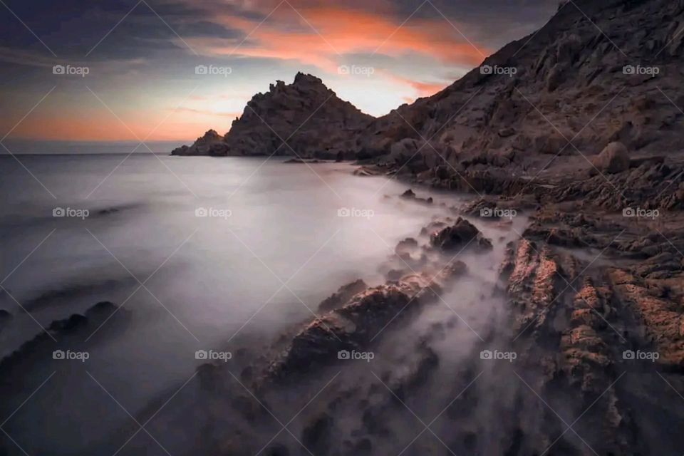 A stunning view of green mountains covered in fog in Yemen
