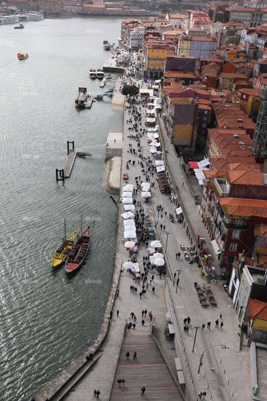 Looking down from the bridge on to a marketplace in Porto Portugal. 