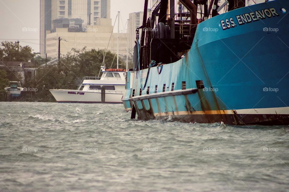 A blue commercial boat docked in the water in Atlantic City, New Jersey 