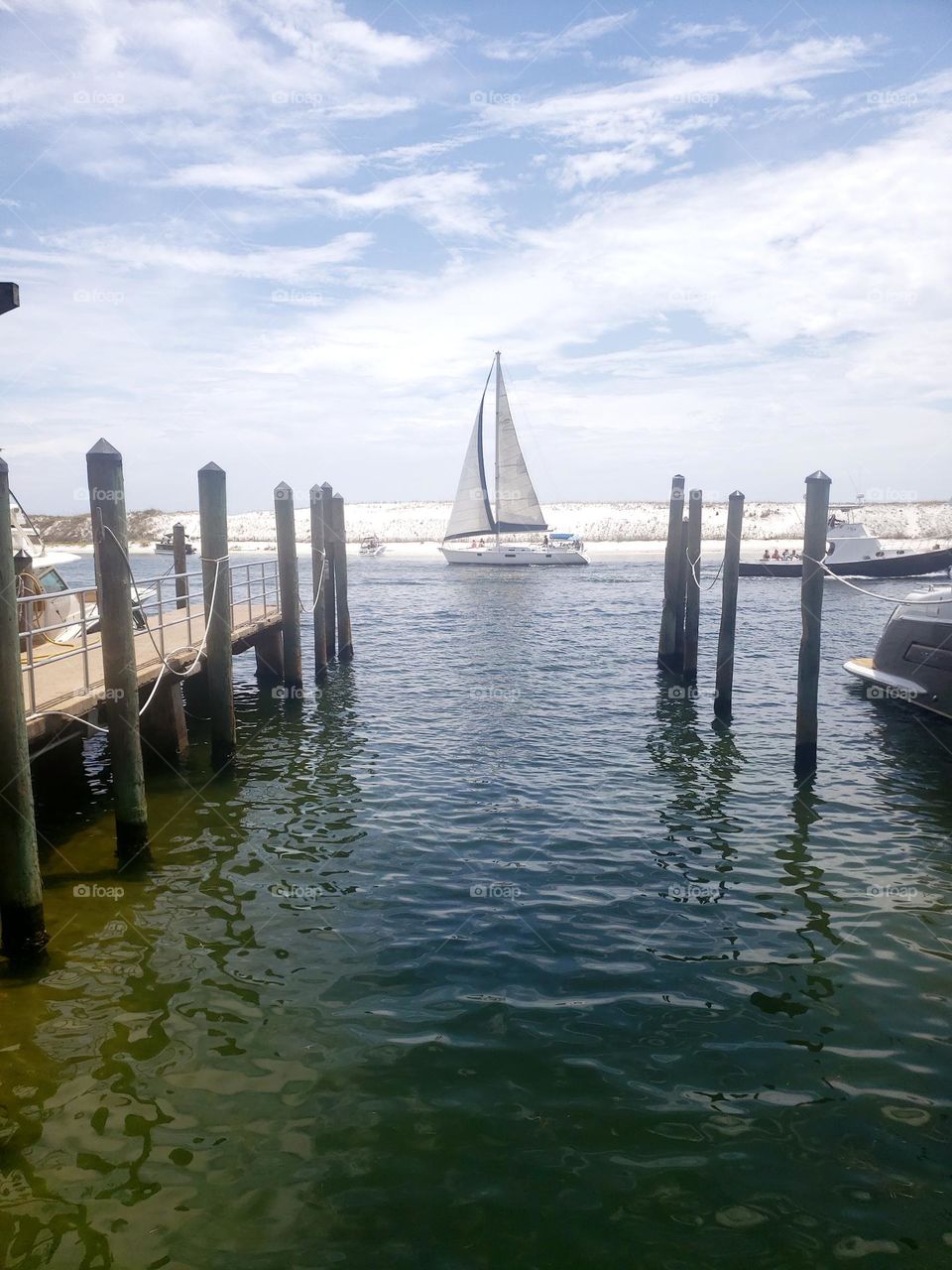 Sail boat leaving the dock