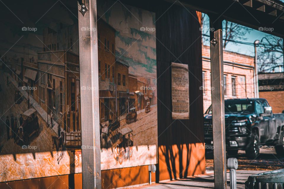 Warm shadows and mural.