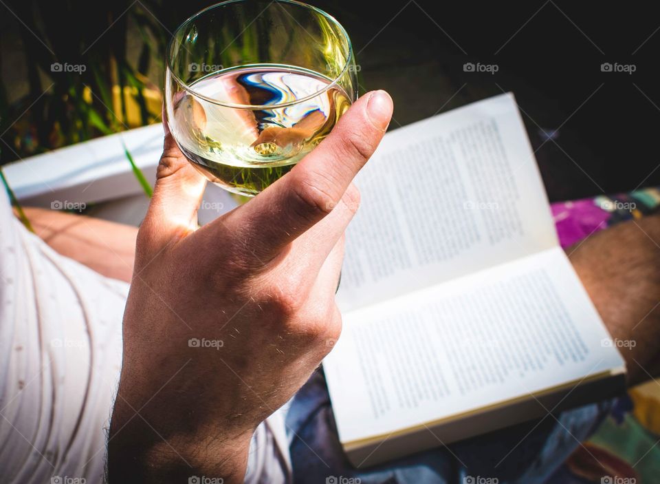 Drink a glass of wine and read a book 