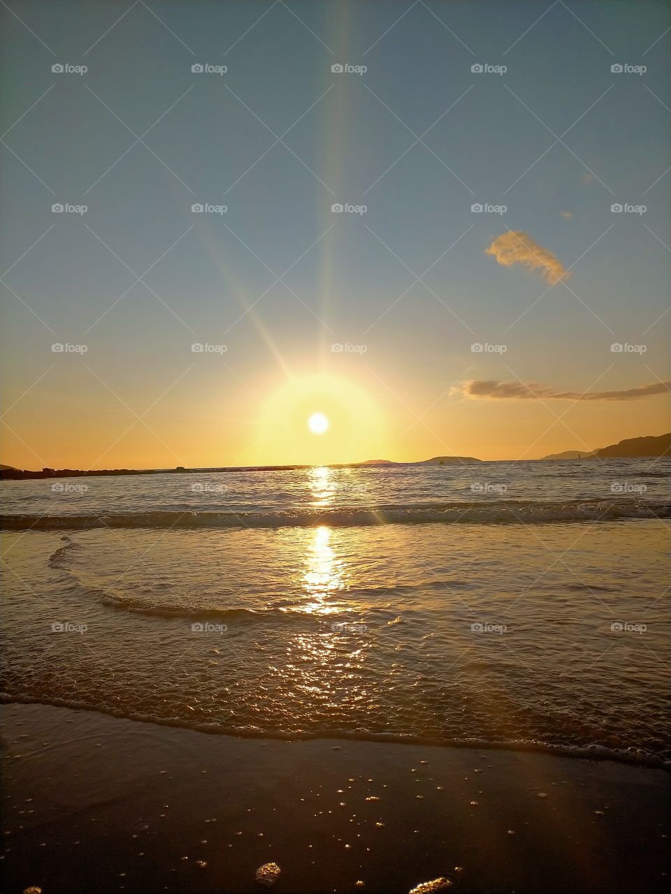 por do sol  na praia .graça de Deus.