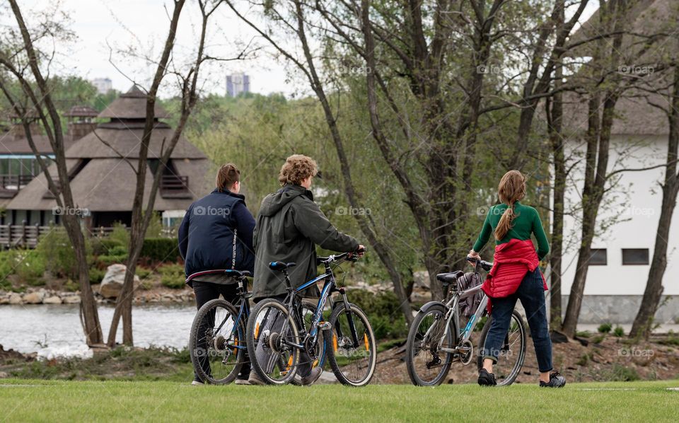 A group of friends with bicycles 