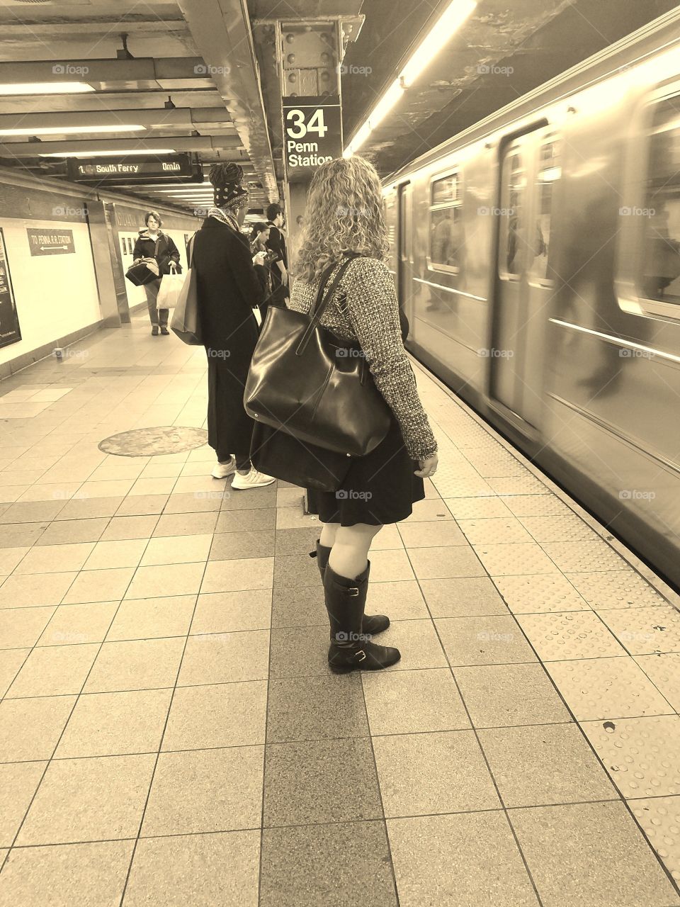 Girl Waiting on Subway Platform in NYC for Train. Sepia Filter. Captured on Android Phone - Galaxy S7. May 2017