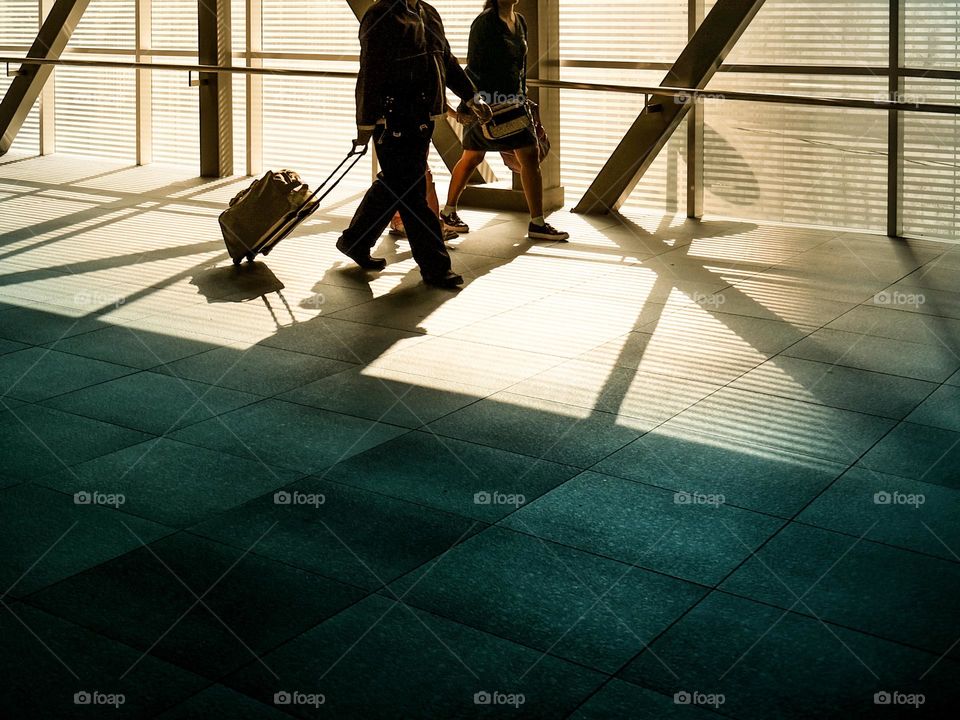 A travelling couple at the airport