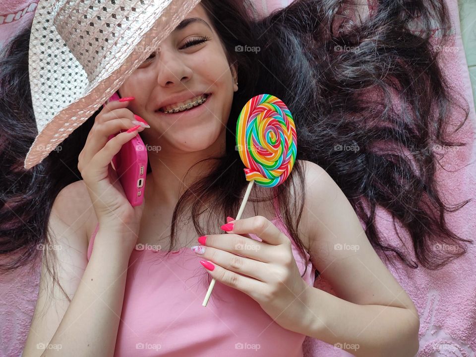 Vibrant Portrait of Girl with Big Lollipop