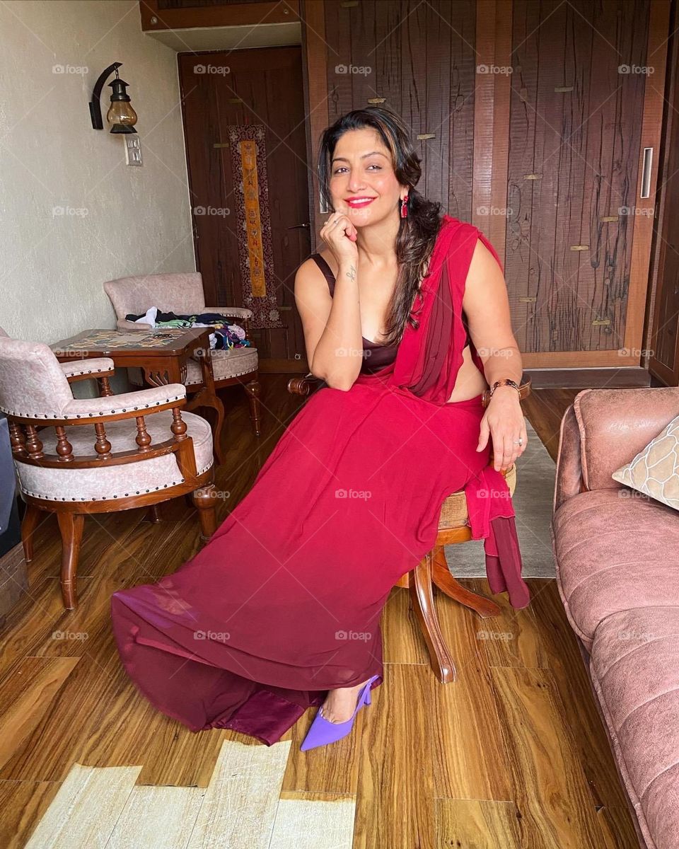 Red saree with sun skin