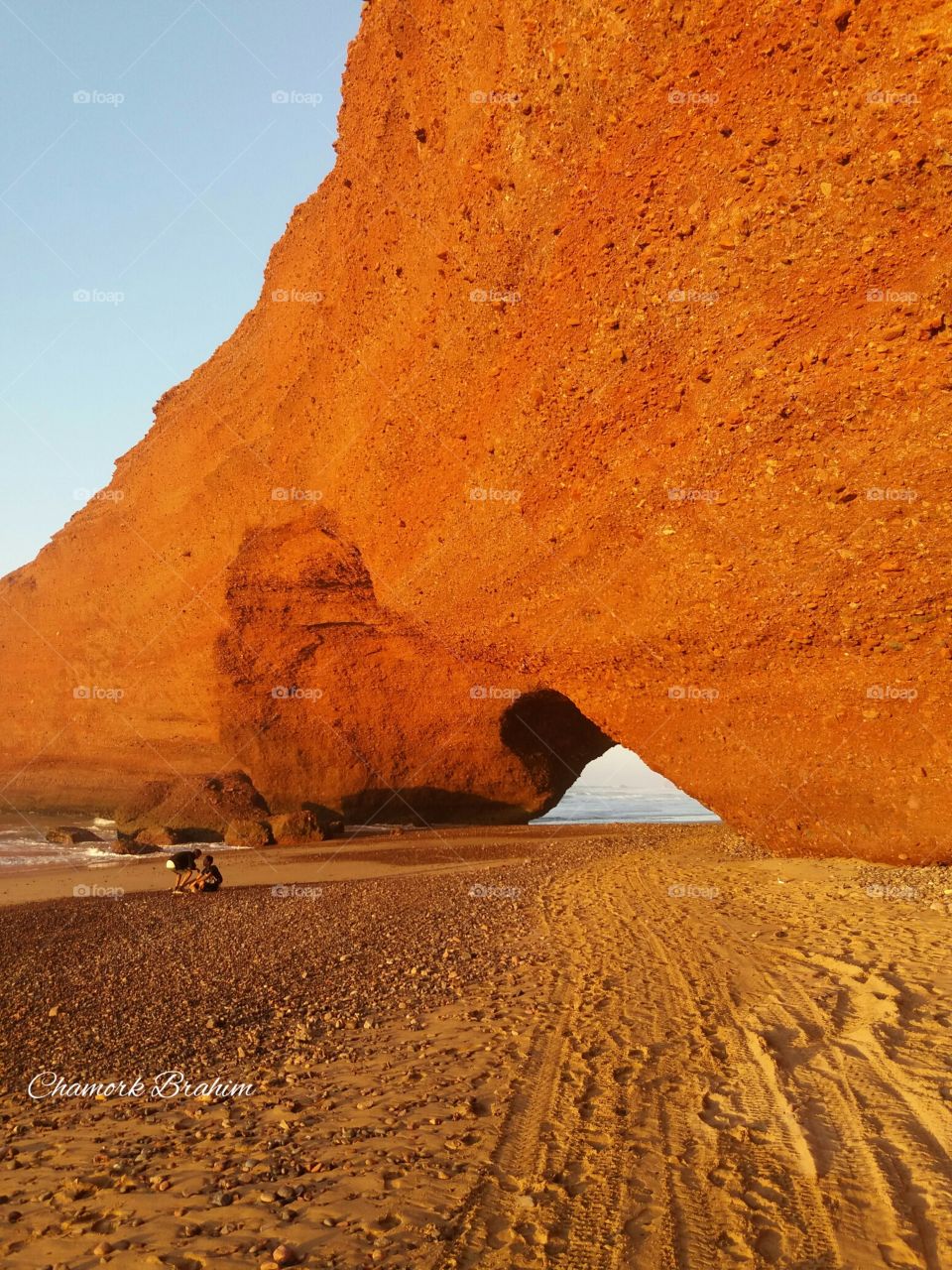 A beautiful arch on the beach of Elghzira in the region of Ifni