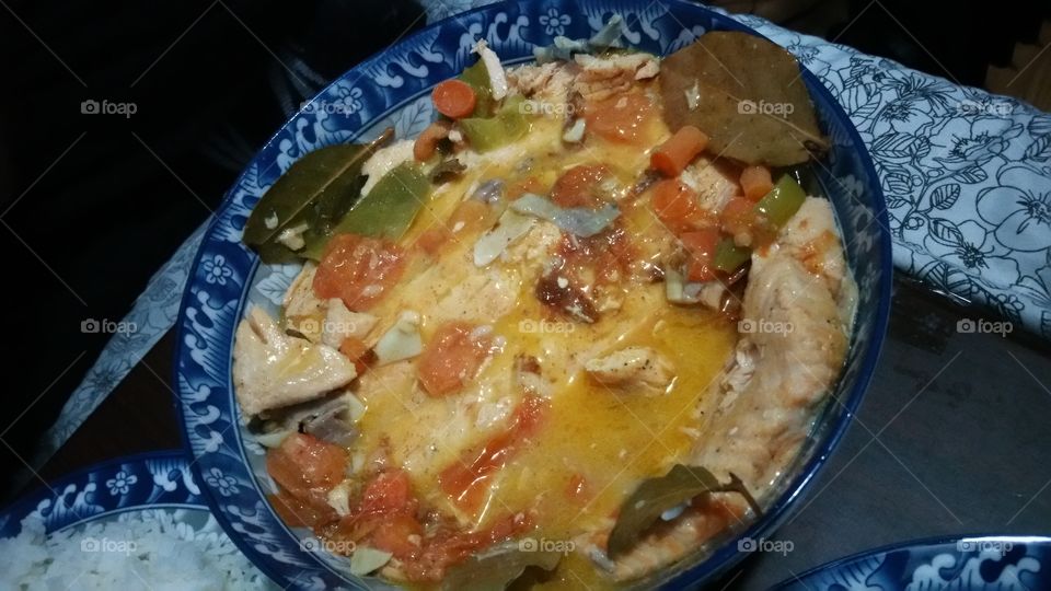 chicken vegetable soup over rice