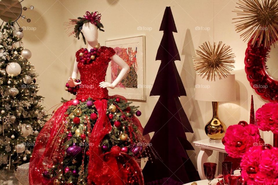 Fashion Forward Christmas. A mannequin in a Christmas tree dress
 
