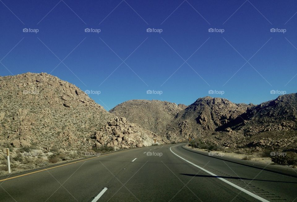 Highway through the desert mountains