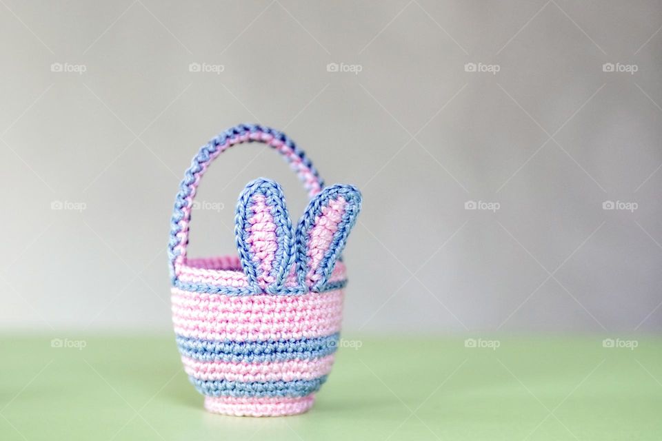 Easter decor.  Knitted bucket with rabbit ears