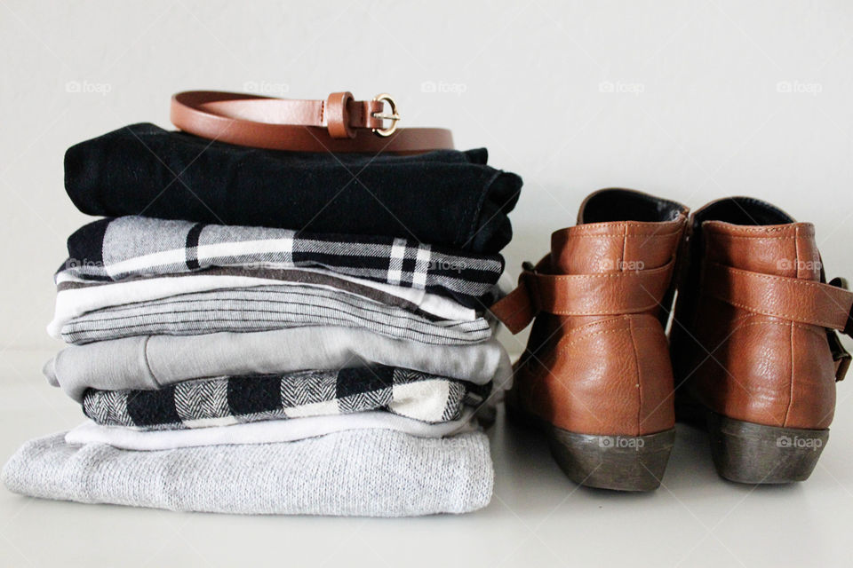 Stack of clothes with belt
