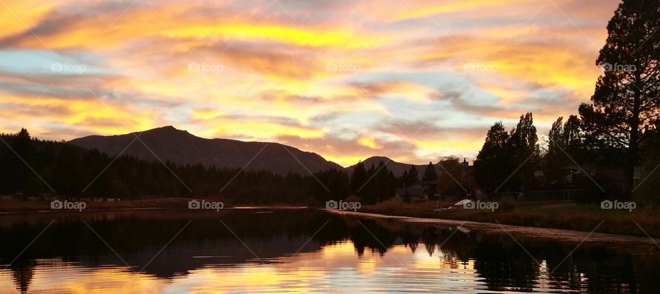 sunset over pond. living in Lake tahoe