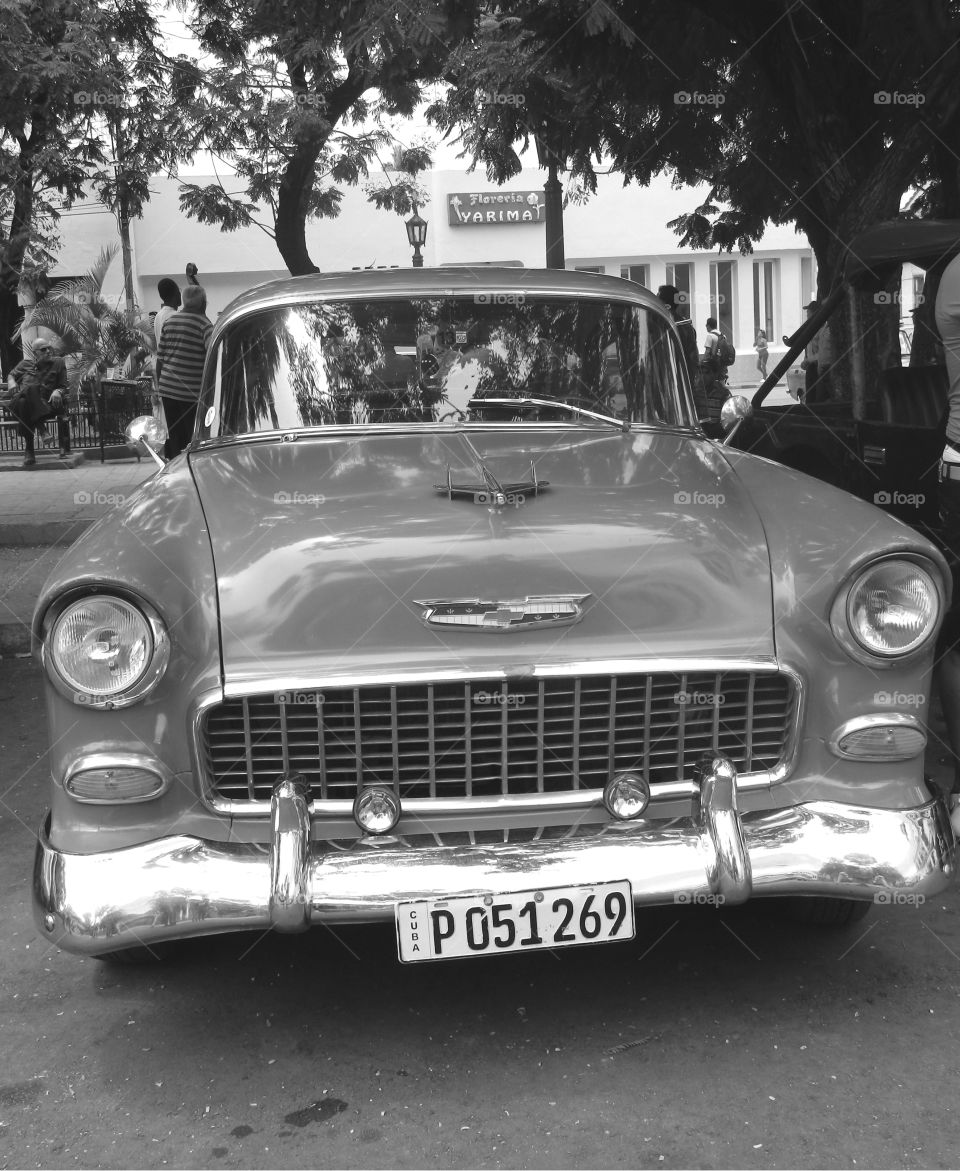 Cuba: Classic Chevy! As I see Santiago de Cuba in black and white, and sometimes in color! Cuba is a special destination and people know how to enjoy themselves, despite obvious signs of poverty and hardships. The streets are filled with vibrant colors and rhythm and it is not uncommon to see people dancing in the streets and alleys to the sound of loud salsa music! Wish I could, but It's impossible to capture it all!