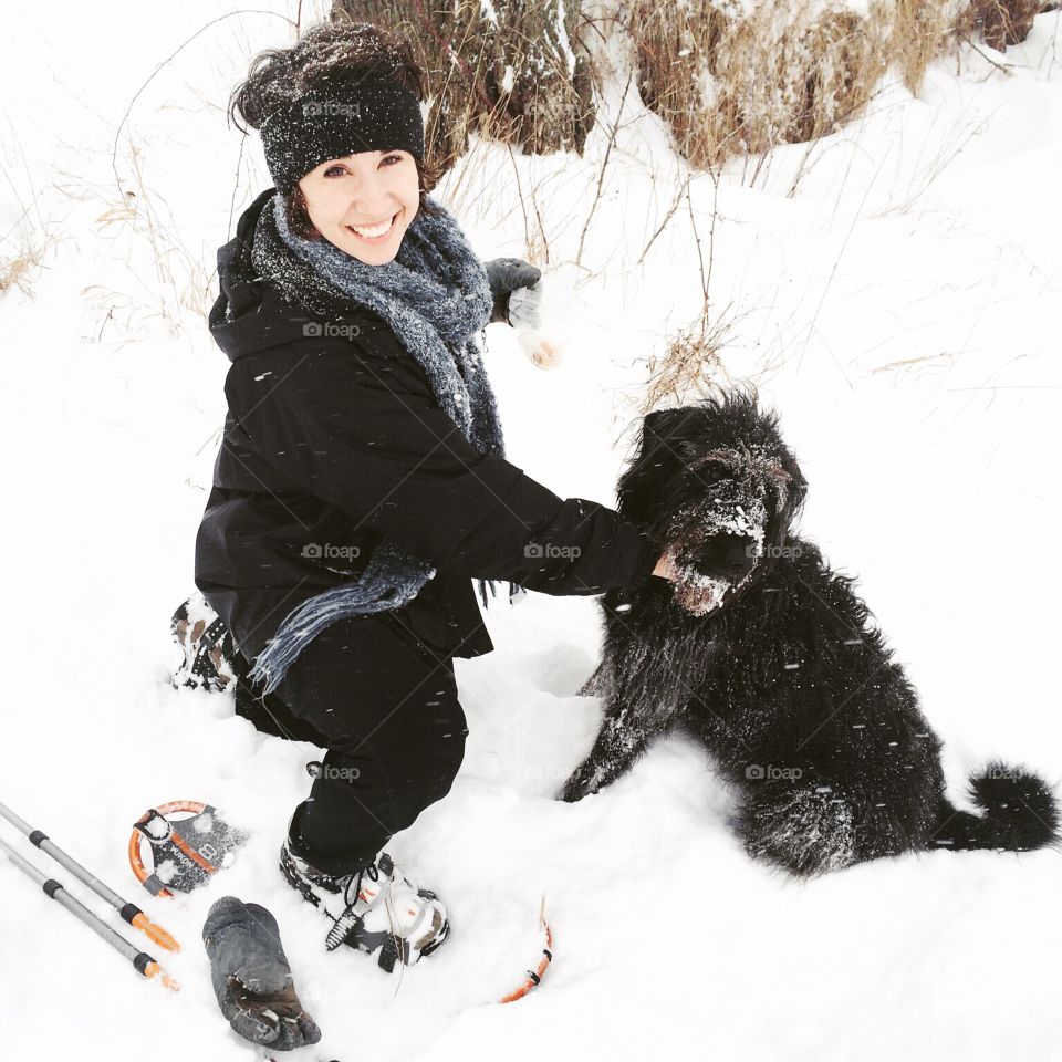 girl, dog, snowshoes