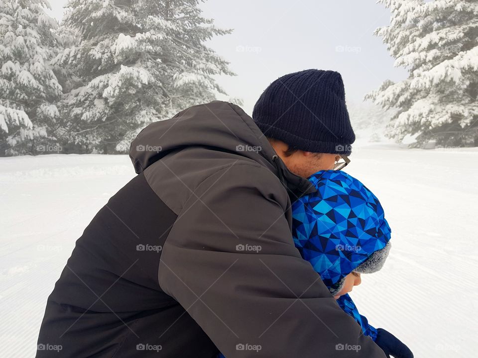 Father and son on snow