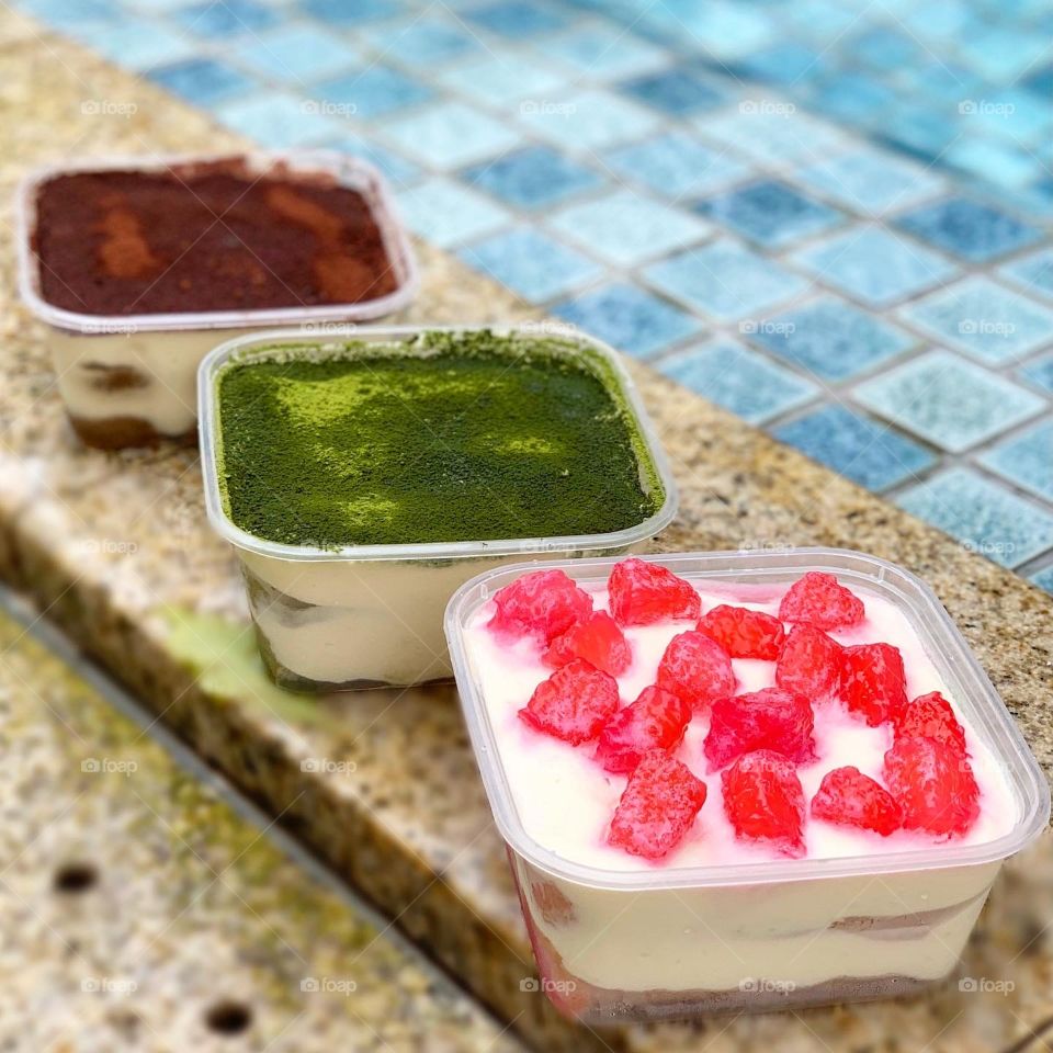 3 tiramisu flavours in an outdoor setting beside the pool - classic, match and red ruby