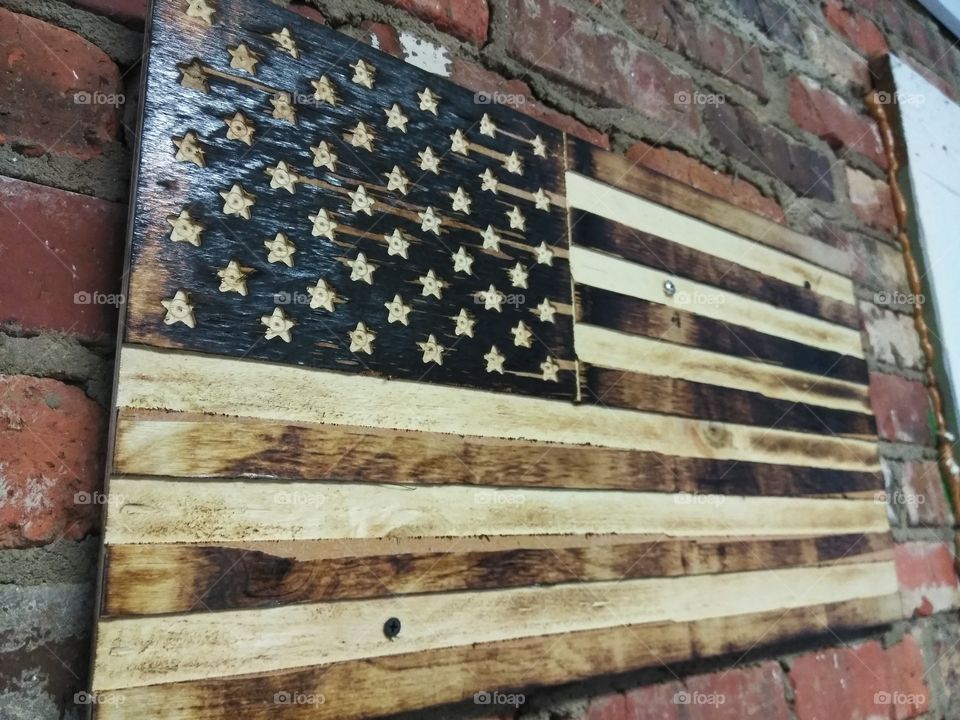 Just a peice of homemade Americana hanging in a local store in a small foothills town.