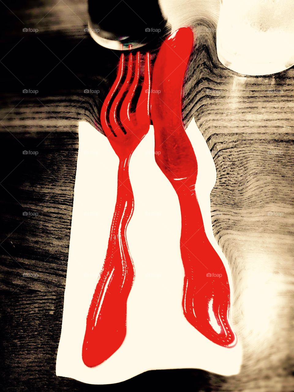 Warped knife and Fork. Warped red knife and fork
