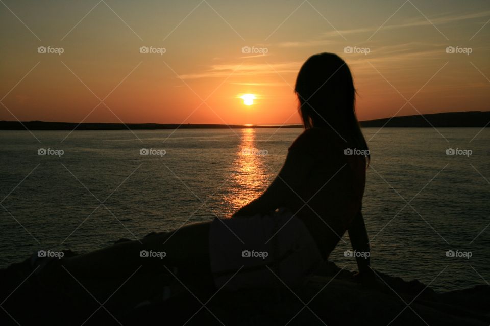 girl silhouette in the sunset