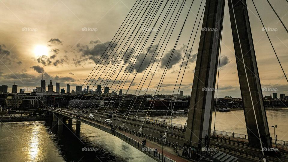 Aerial view of Świętokrzyski bridge in Warszawa. City center and river on background.