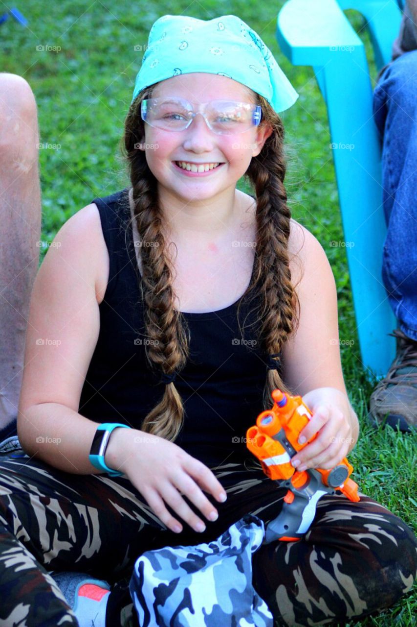 Close-up of a happy girl wearing eyeglasses