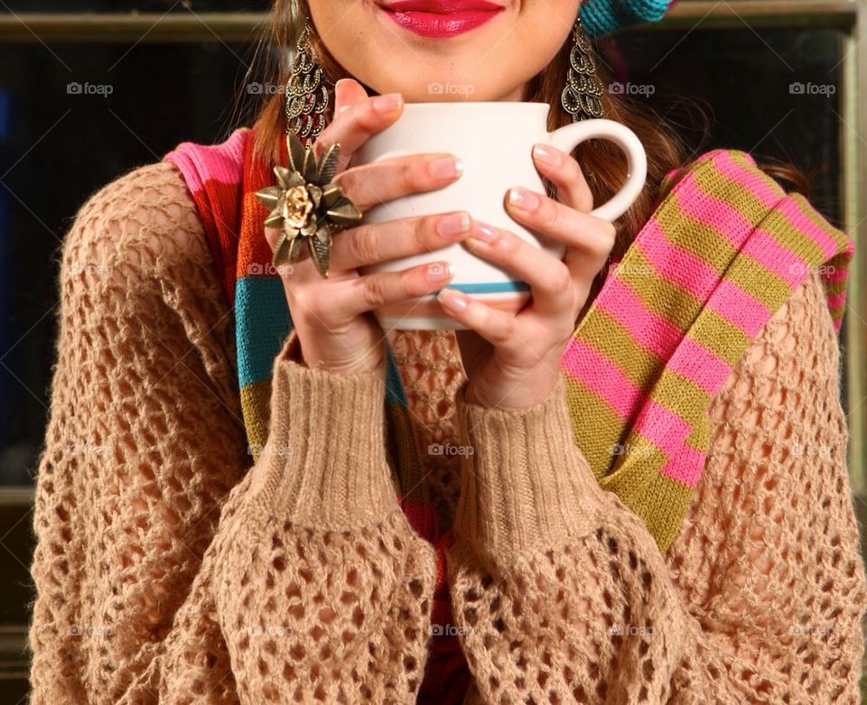 Cute girl Sipping hot coffee