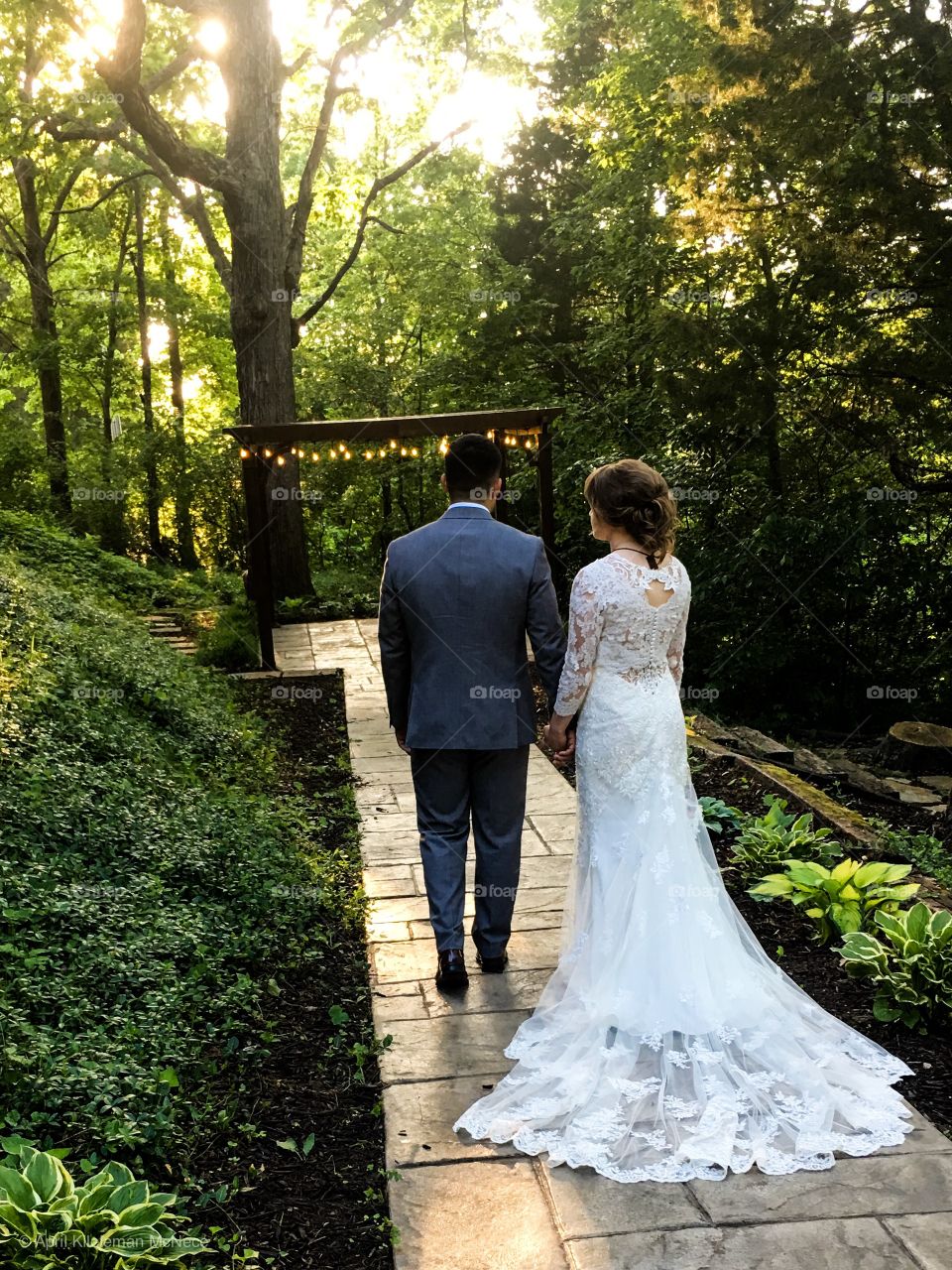 Bride and groom walking into forever with each other. 