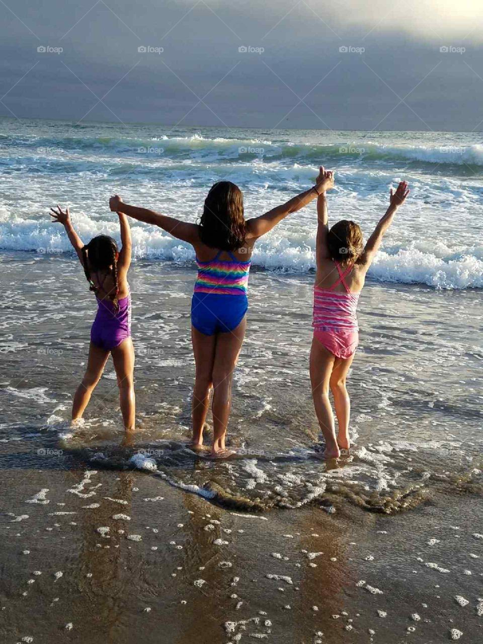 kids enjoying the beach in the summer
