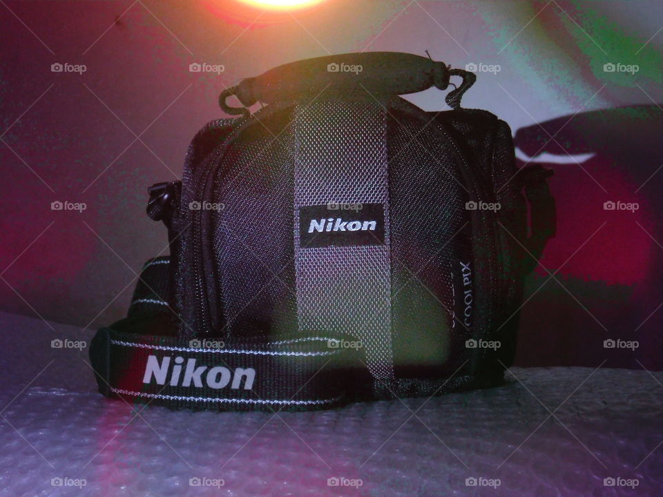 product photography, Black camera case or bag