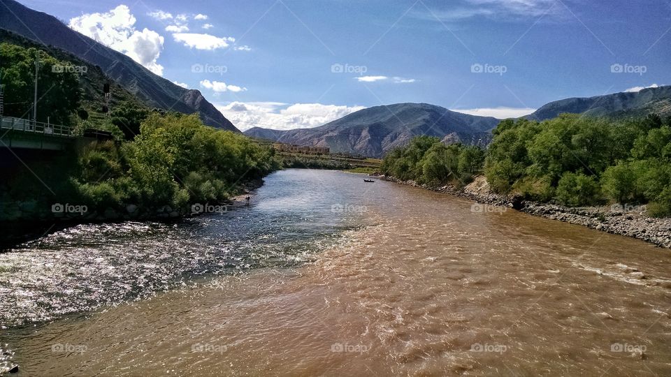 Clear waters of The Roaring Fork River meet the muddy Colorado River