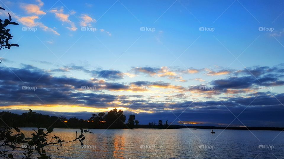 Idyllic view of lake at sunset