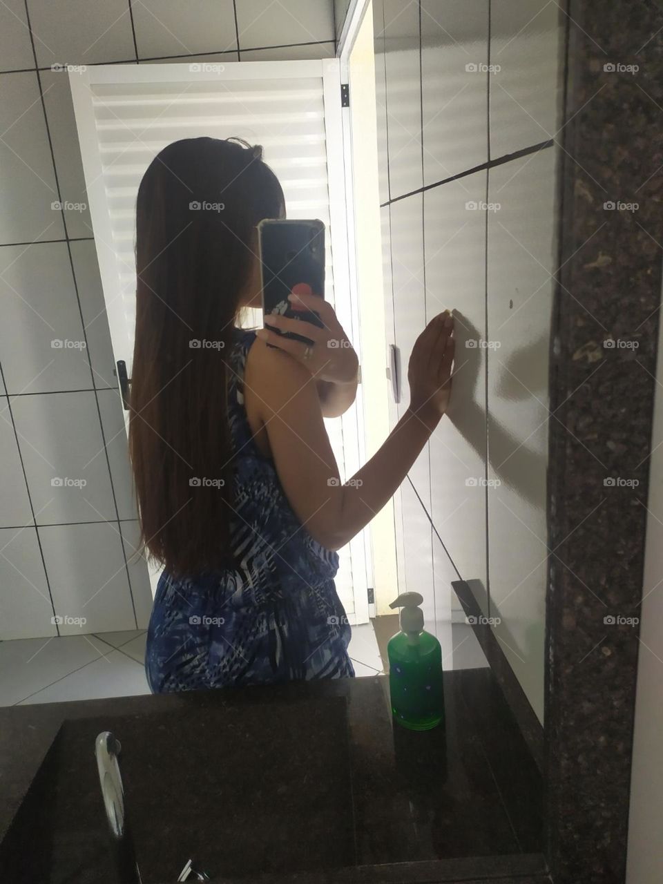 cabelo no espelho