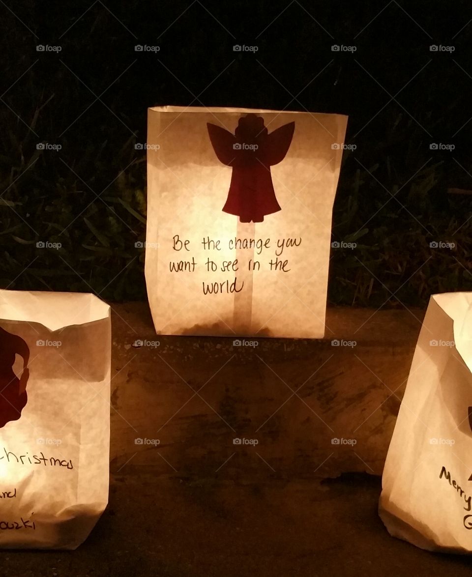 Luminary message. Christmas Eve luminaries around Spring Bayou in Tarpon Springs Florida