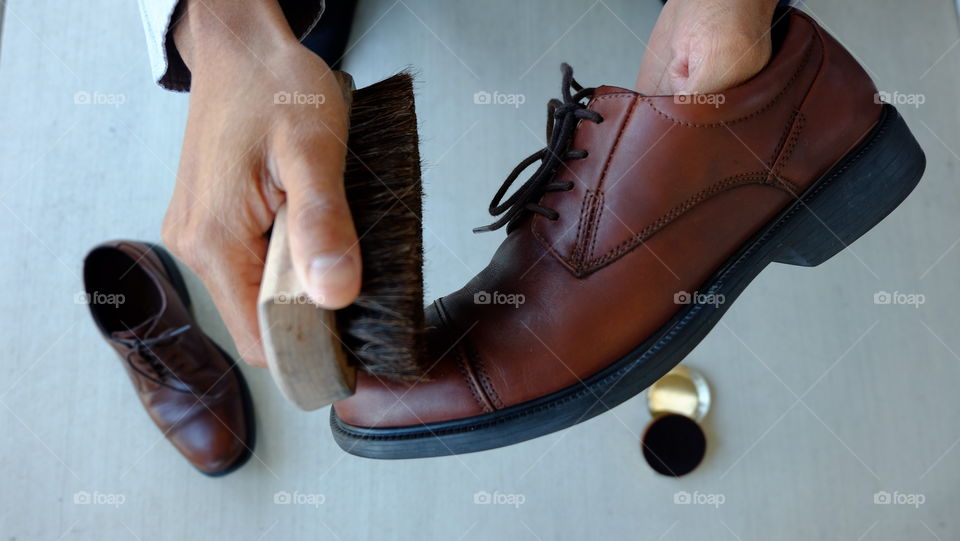 Man Polishing shoes