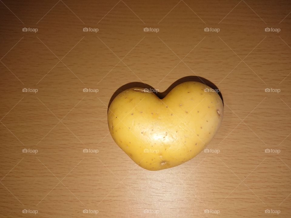 heart-shaped potato on the table
