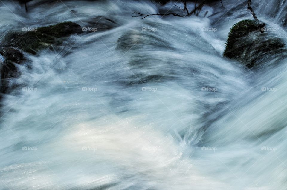 water in motion - water and the river in the spring park in Poland