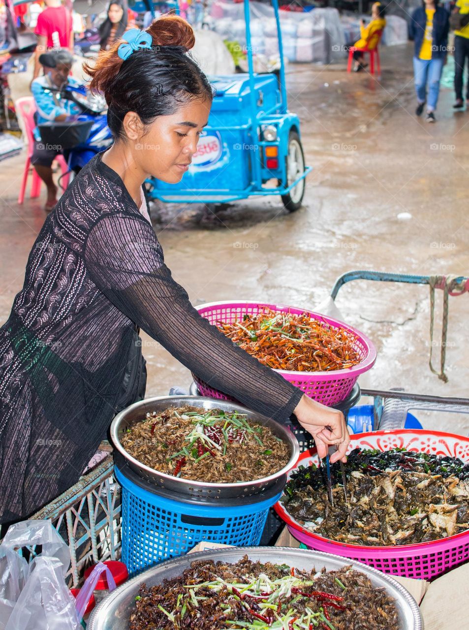 a Thai Woman at the Thai Street Chong Chom Market in Surin somewhere in Isan Thailand Southeast Asia