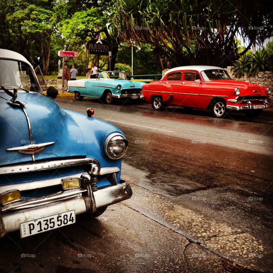 Havana Streets. Taken in September 2015, this is a typical street scene in Havana, Cuba. These classic American cars are parked just outside the Hotel de Nacional.