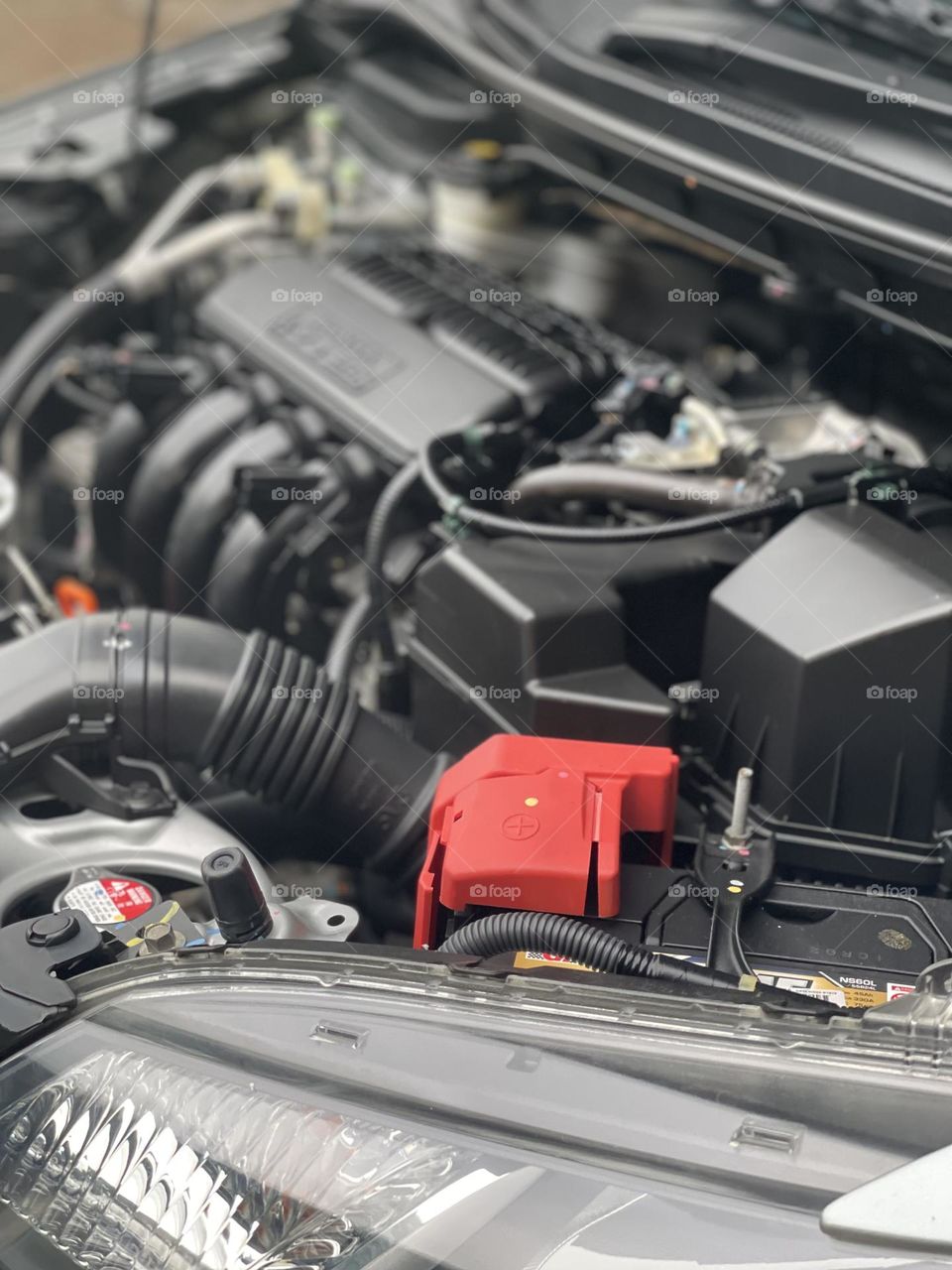 Under the hood. Car engine of a new car for sell. Close up view