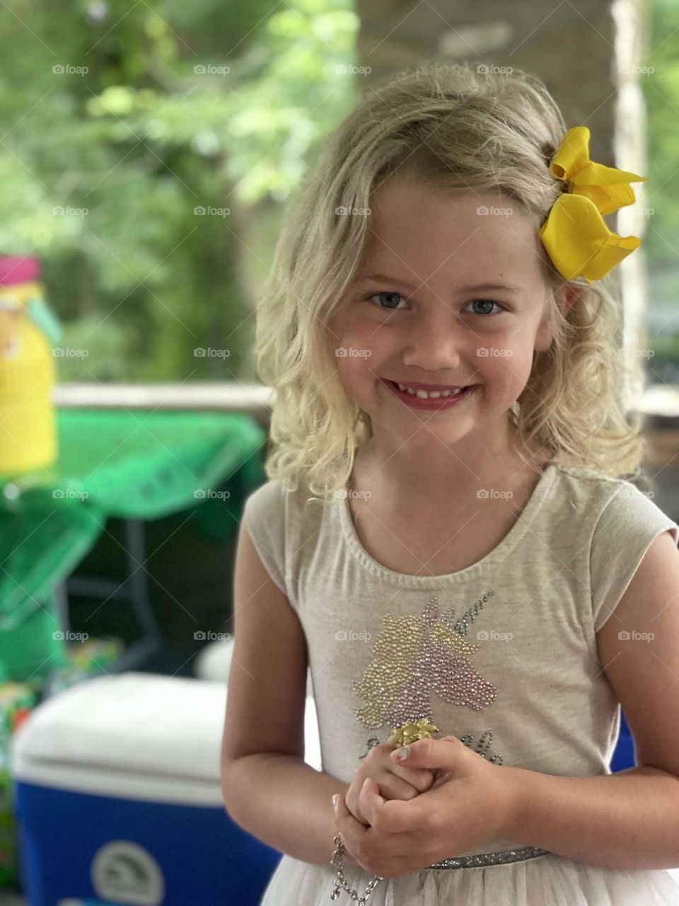 Adorable little girl smiling outside