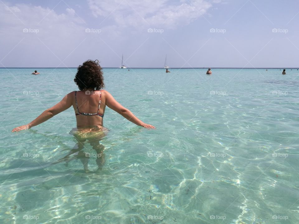 Girl immersed in sea water