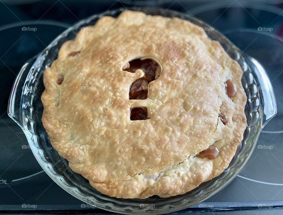 Baking a pie, fresh baked apple pie, question mark on top of crust of pie, mystery pie, homemade pie 