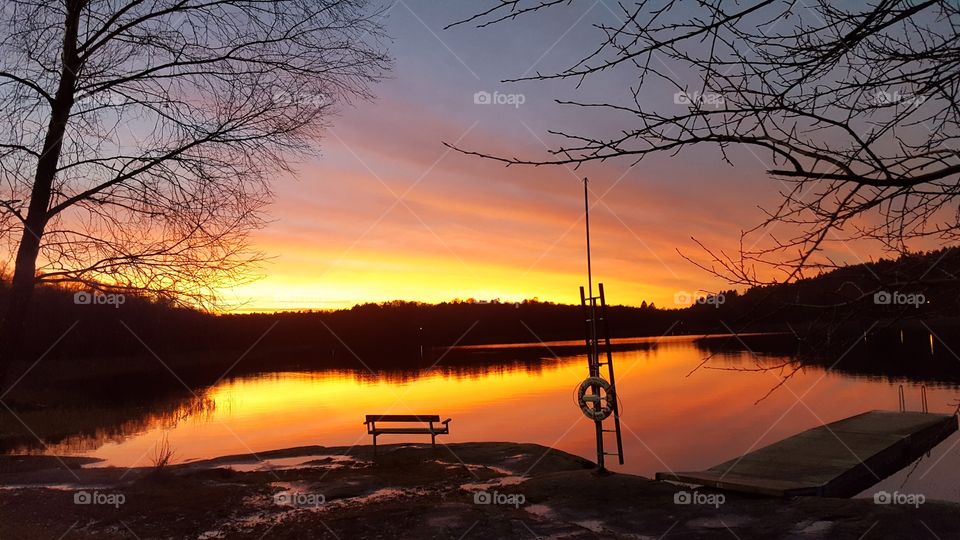 Reflection of vibrant sky at lake