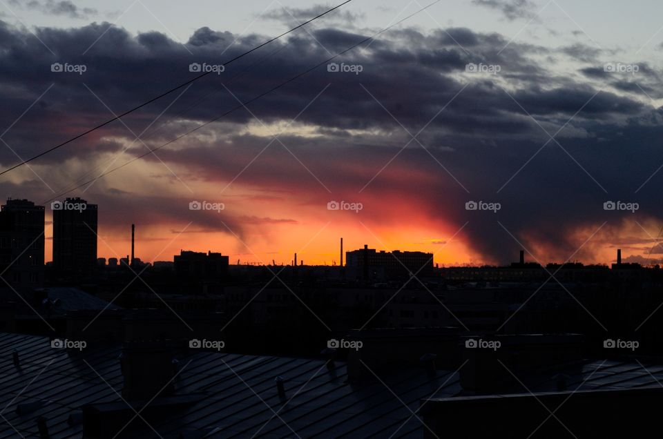 Sunset in the city. Evening light.