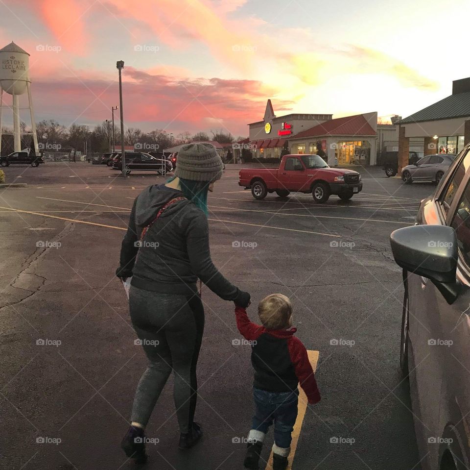 mother and son checking out a beautiful sunset