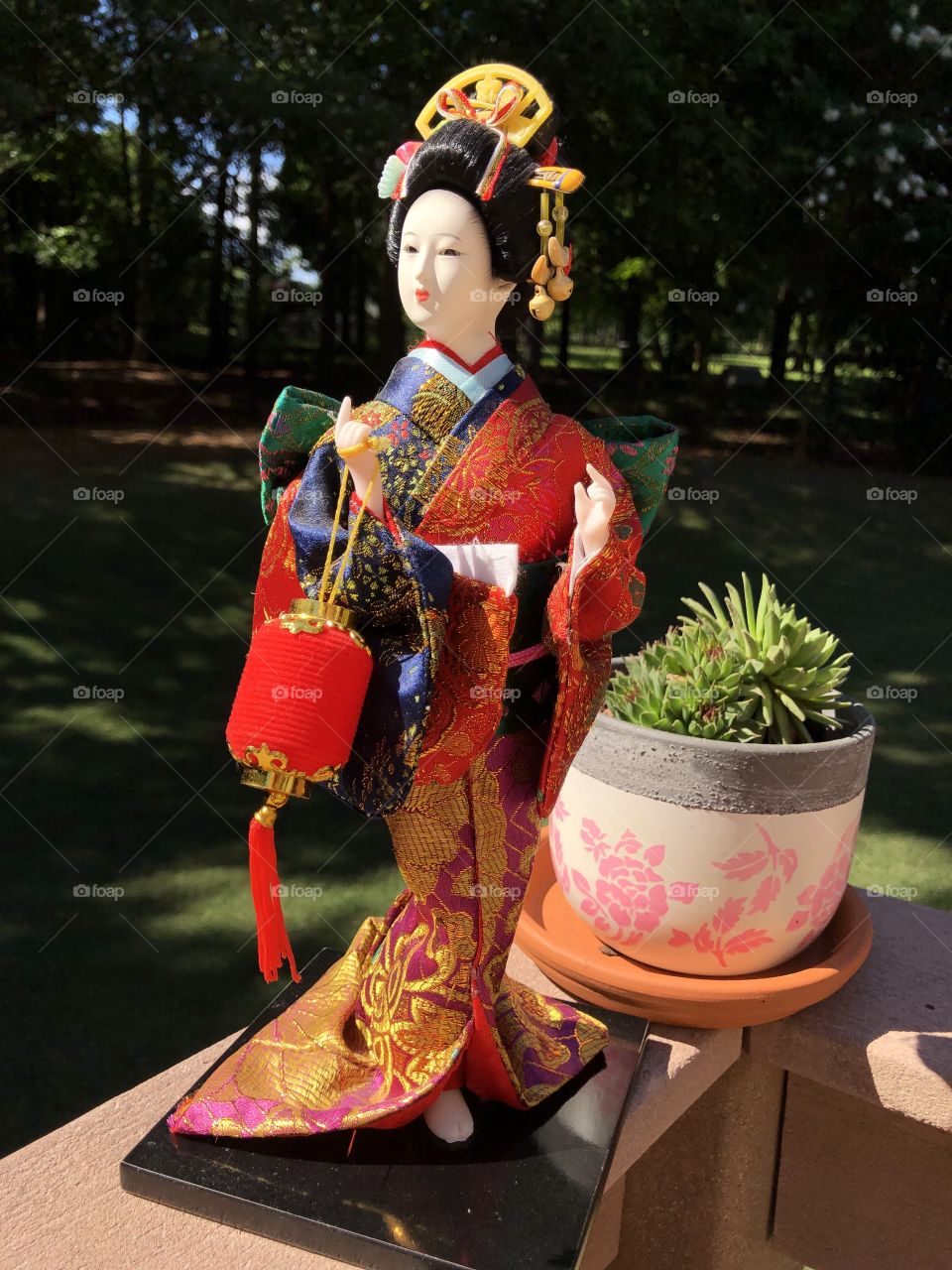 A precious Christmas gift from my mother due to my love of the movie “Memoirs of a Geisha”. A beautiful Geisha doll in a fashionable colorful silk kimono. No editing just good photography.