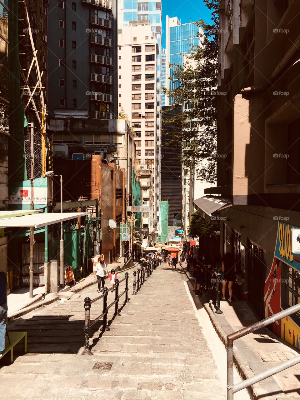 Streets of Hong Kong. Amazing place filled w wealth, business, luxury, and modernization, but also holding on tight to history, culture, and grit. 